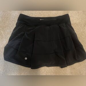 Size 4 Lululemon black skirt with built in shorts
